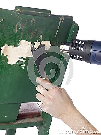 Removing paint using a heat gun Stock Photo