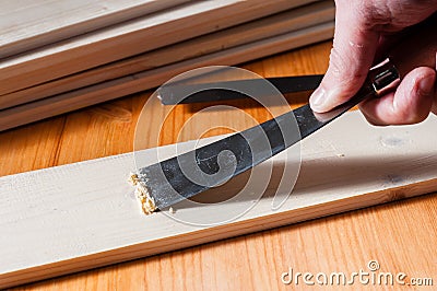 Removing paint from a wood surface Stock Photo