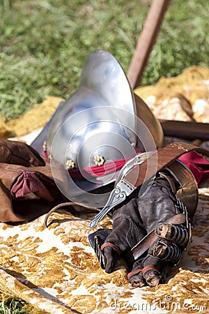 Renaissance armours: helmet and glove. Stock Photo