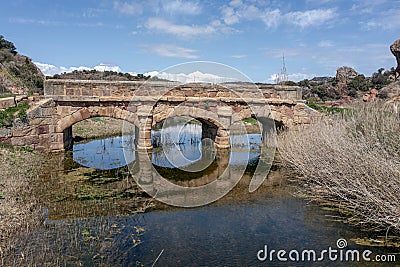 Renaissance bridge from the 17th century over the Salado river. Riba de Santiuste, Spain Stock Photo