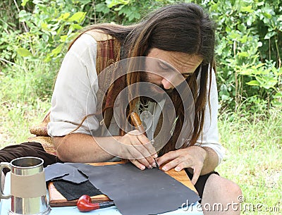 Renaissance Fair Leather Craftsman Editorial Stock Photo