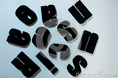 Renaissance text, extruded polystyrene letters painted in black paint. on a light white background.blank for decoration, logo maki Stock Photo