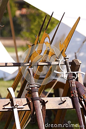 Renaissance Weapons swords, daggers and halberds. Stock Photo