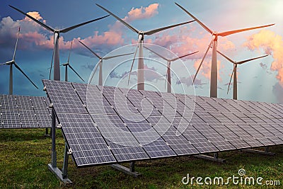Renewable and alternative power production concept. Photovoltaic solar panels and wind turbines in power plant. Stock Photo