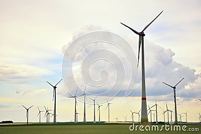 Renewable energies - power generation with wind turbines in a wind farm Stock Photo