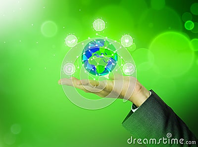 NFT and Digital Art Concept Background with Man TouchingRenewable Energy Concept Background with Globe in a hand. Stock Photo