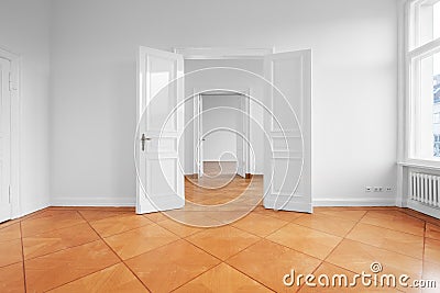 Renovated empty apartment with double wing door and historic pa Stock Photo