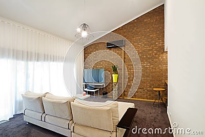 Renovated 70s architectural apartment with angeld roofline Stock Photo