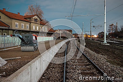Renovating the historical train station of Ljubljana Siska, making temporary platforms next to the railway track, putting down Stock Photo