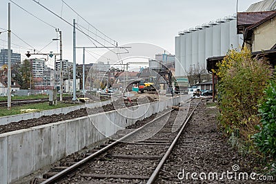 Renovating the historical train station of Ljubljana Siska, making temporary platforms next to the railway track, putting down Stock Photo