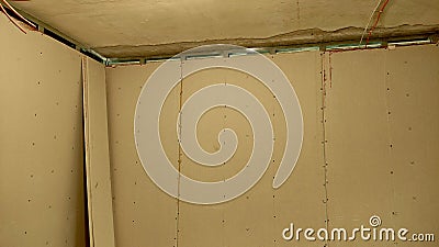 Renovation of the apartment, view of the ceiling, walls are plastered Stock Photo