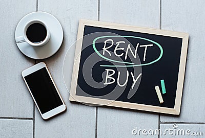 Rent not Buy blackboard concept. Choosing buying over renting. Stock Photo