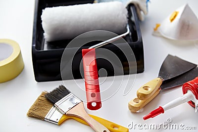 Different painting work tools on white background Stock Photo