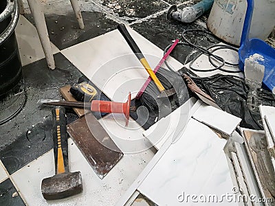 Repair building with tools and hammer, chisel, cleaver, brush, dustpan and tape measure Stock Photo