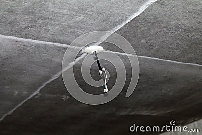 Repair of ceilings in new building bare wire on the ceiling Stock Photo