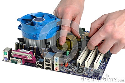 Repair of computer motherboard Stock Photo