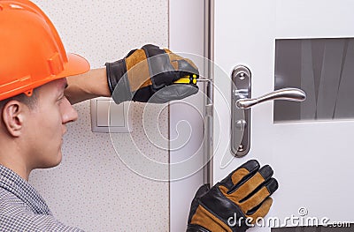 Repair door lock Stock Photo