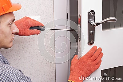 Repair door lock Stock Photo