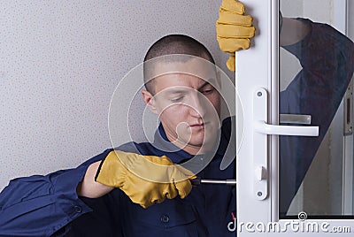 Repair door lock Stock Photo