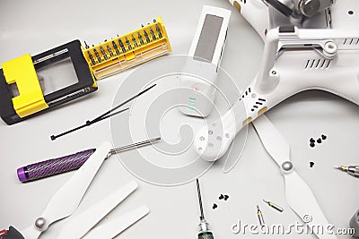 Repair maintenance drone, screws, screwdrivers, battery clamps Stock Photo