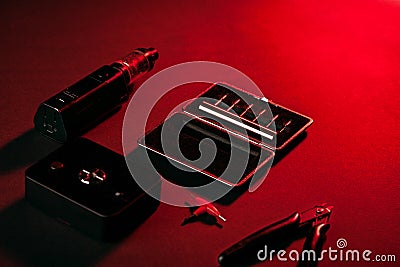 Vaping device mod on dark background Stock Photo