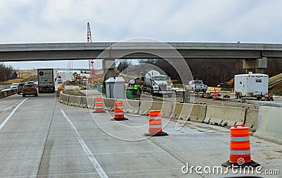 Repair of road surfacethe dirty work of the excavator Editorial Stock Photo