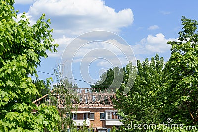 Repair of the roof and ceilings on an old five-story Soviet building in Russia Stock Photo