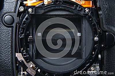 Repair SLR camera. Mirror in the camera, lens mount Stock Photo