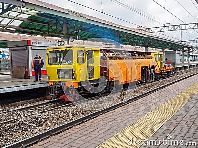 Repair train near the railway station. Russia, Moscow, October 2017. Editorial Stock Photo