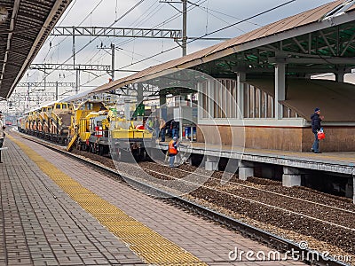 Repair train near the railway station. Russia, Moscow, October 2017. Editorial Stock Photo