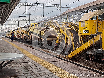 Repair train near the railway station. Russia, Moscow, October 2017. Editorial Stock Photo