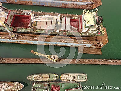 Repair vessels hull ship, tanker in shipyard Editorial Stock Photo