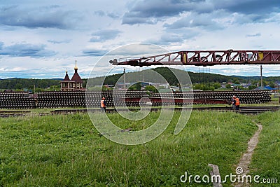 Repair work on the railway road in the countryside in Russia Editorial Stock Photo