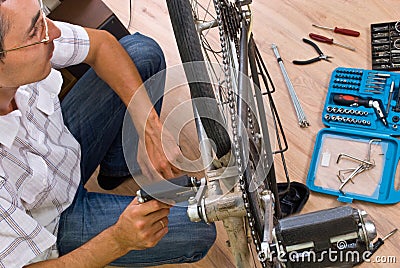 Repairing bike Stock Photo