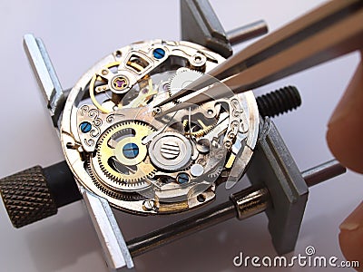 Repairing classic mechanical watch Stock Photo