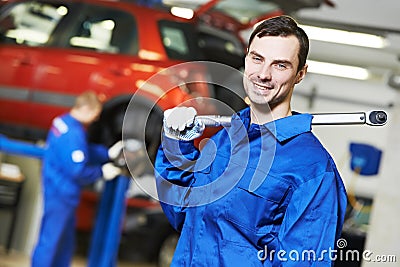 Repairman auto mechanic at work Stock Photo
