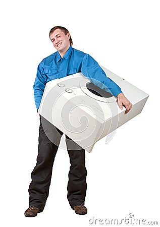Repairman holding washing machine Stock Photo