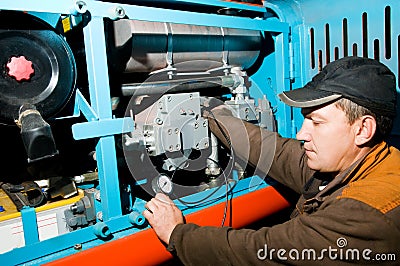 Repairman using manometer Stock Photo