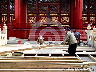 Repairmen repairing Biyong Temple road Editorial Stock Photo