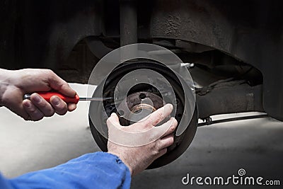 Replacing the car brake shoes Stock Photo