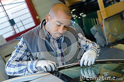 Replacing the crack windshield Stock Photo