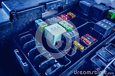 Replacing fuses in the fuse box of the car. Stock Photo