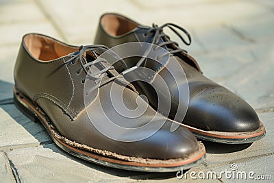 replacing wornout soles on mens dress shoes Stock Photo