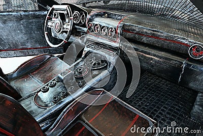 Replica of driving wheel and interior of grand tourer car Mercedes AMG GT R made from scrap metal Editorial Stock Photo