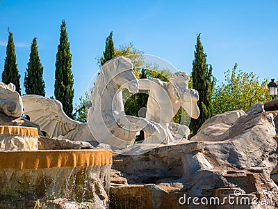 Replica of the Trevi Fountain in the Europa Park of Torrejon de Ardoz with a beautiful blue sky with clouds in the background Editorial Stock Photo