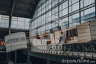 A Replica of Voisin de Caters N IV antique military airplane in The Royal Museum of the Armed Forces and Military History in Editorial Stock Photo