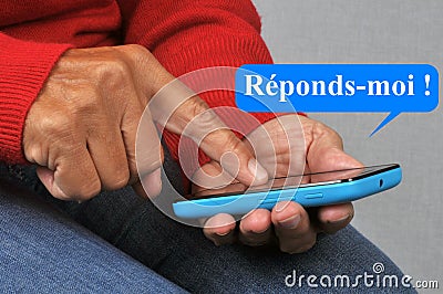 Reply message sent with a smartphone Stock Photo