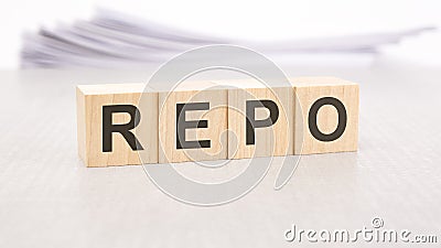 repo word written on wood cubes with white background Stock Photo