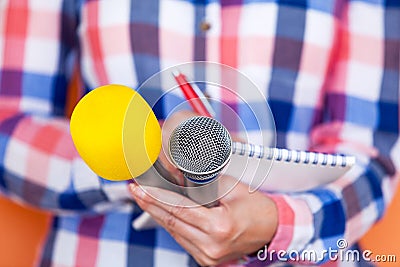Reporter. News conference. Press interview. Microphone. Stock Photo