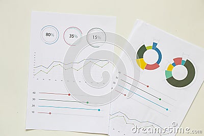 reports and histograms on paper on the table, analytics and statistics on paper, business Stock Photo